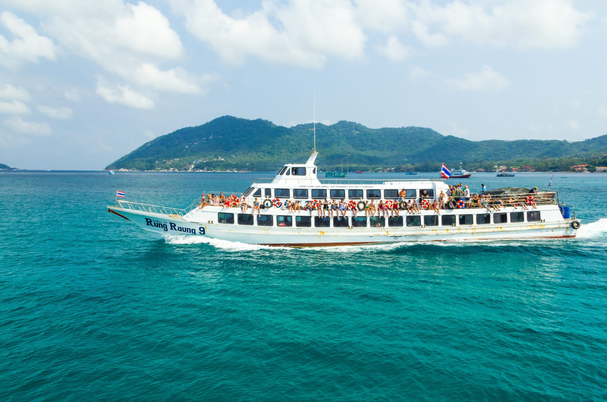 The ferry journey from Koh Samui to Koh Tao and Koh Nang Yuan ,Thailand.a passenger traveling on a boat ride to enjoy the sun.